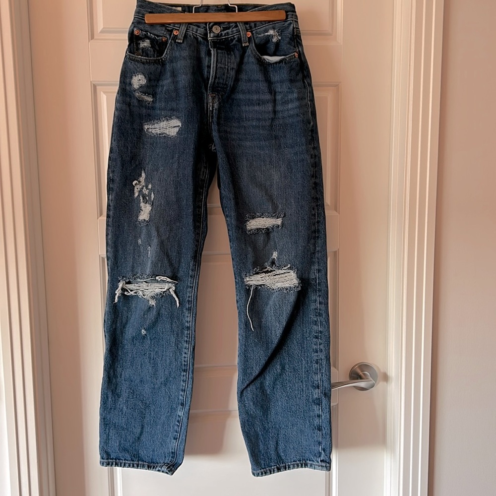 Levi’s 501 distressed jeans, wide legs